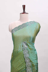 Green stone work designer saree with self heartin design scallop border and matching blouse