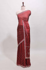 Maroon stone work floral motifs designer saree with self design scallop border and matching blouse