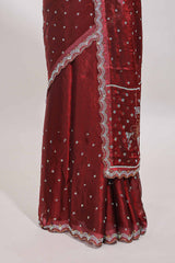 Maroon stone work floral motifs designer saree with self design scallop border and matching blouse