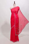 Pink stone work floral motifs designer saree with self design scallop border and matching blouse