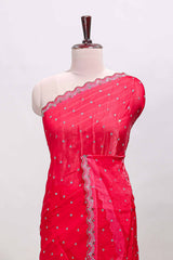 Pink stone work floral motifs designer saree with self design scallop border and matching blouse