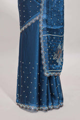 Midnight blue stone work floral motifs designer saree with self design scallop border and matching blouse
