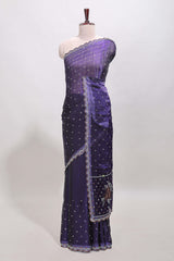 Violet stone work floral motifs designer saree with self design scallop border and matching blouse