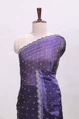 Violet stone work floral motifs designer saree with self design scallop border and matching blouse