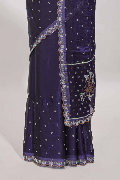 Violet stone work floral motifs designer saree with self design scallop border and matching blouse