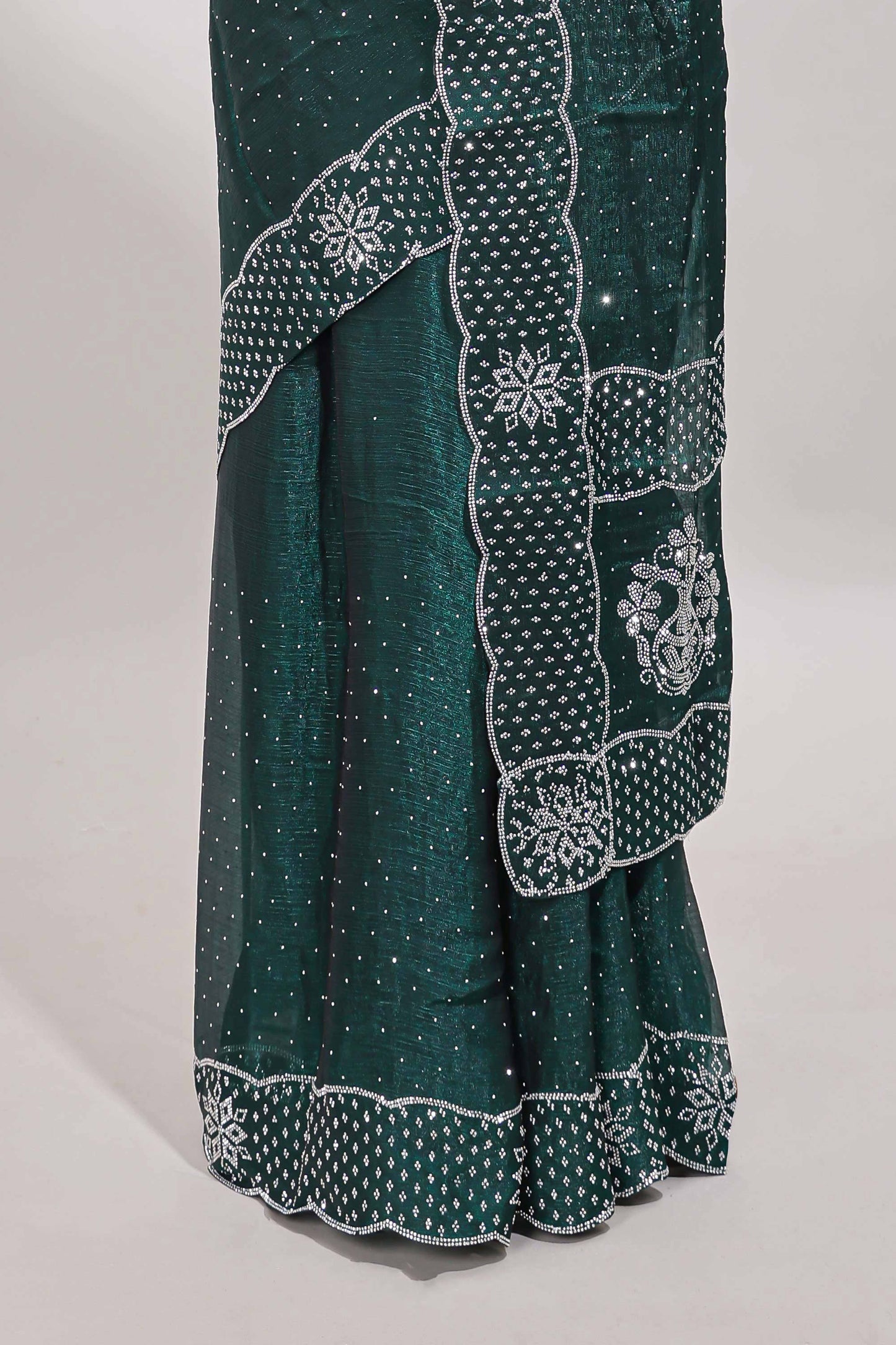 Green dotted stone work designer saree with self floral design scallop border and matching blouse