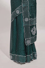 Green dotted stone work designer saree with self floral design scallop border and matching blouse
