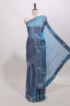 Blue dotted stone work designer saree with self floral design scallop border and matching blouse
