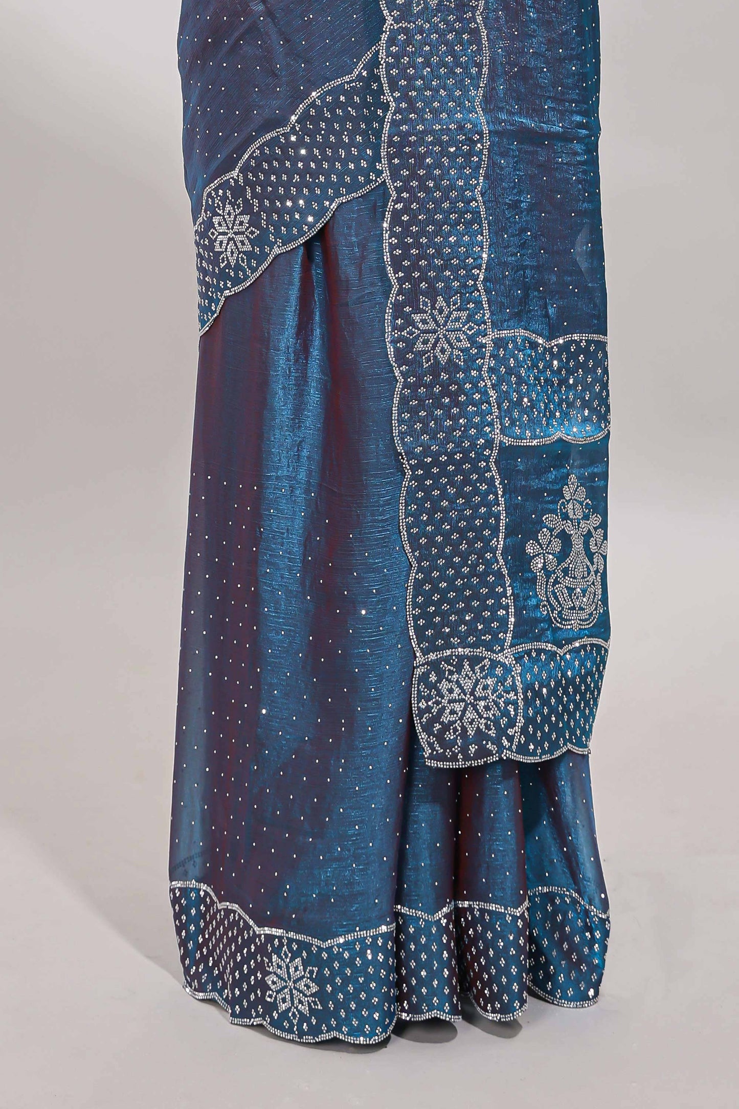 Blue dotted stone work designer saree with self floral design scallop border and matching blouse