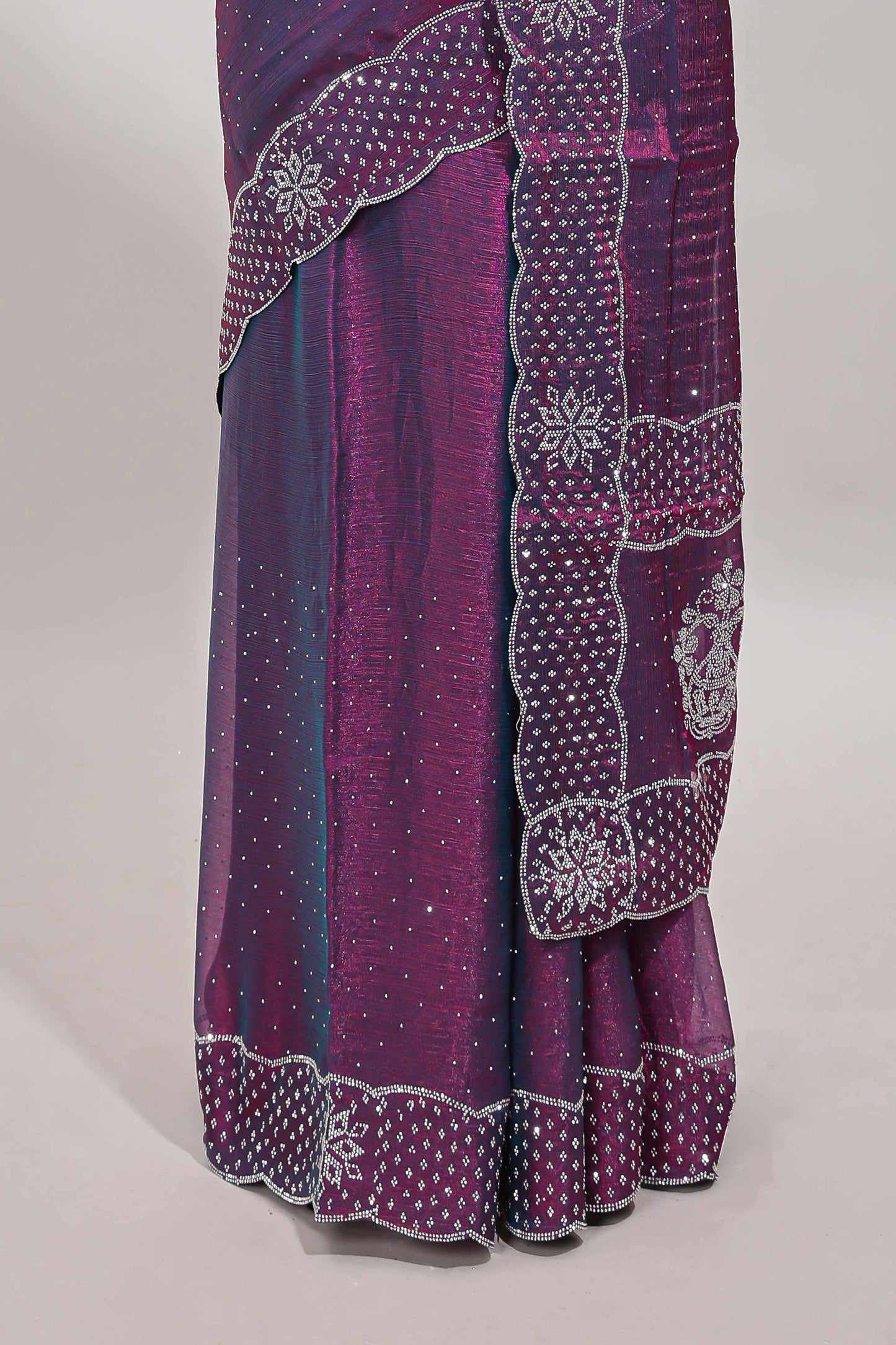 Purple dotted stone work designer saree with self floral design scallop border and matching blouse