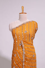 Orange saree with elegant sequin embellishments and a shimmering border along with embroidered blouse piece