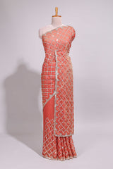 Coral pink saree with elegant silver sequin diamond embroidery featuring a shimmering border and pallu along with blouse
