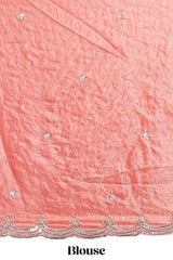 Coral pink saree with elegant silver sequin diamond embroidery featuring a shimmering border and pallu along with blouse