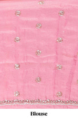 Baby pink saree with silver sequin wavy line embroidery floral motifs and a sparkling embellished border along with matching blouse