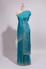 Teal blue saree with sequin striped embroidery scattered butti detailing and embellished border along with matching blouse