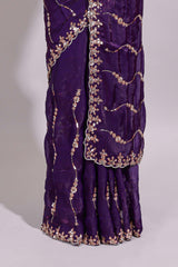 Purple saree with gold sequin wave pattern floral embellished border and matching designer pallu along with work blouse