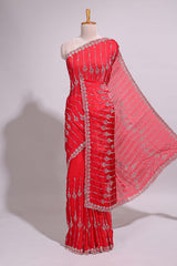 Red saree with silver vertical sequin lines floral motifs embellished border and matching pallu detailing along with matching blouse