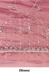 Onion pink saree with silver sequin vertical lines floral motifs embellished border and matching pallu design along with matching blouse