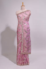 Onion pink saree with sequin abstract wave embroidery and a detailed embellished border along with matching blouse