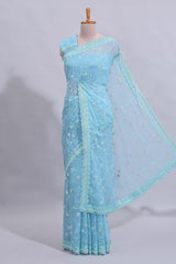 Blue floral design chamki work designer saree with self scallop border and matching blouse