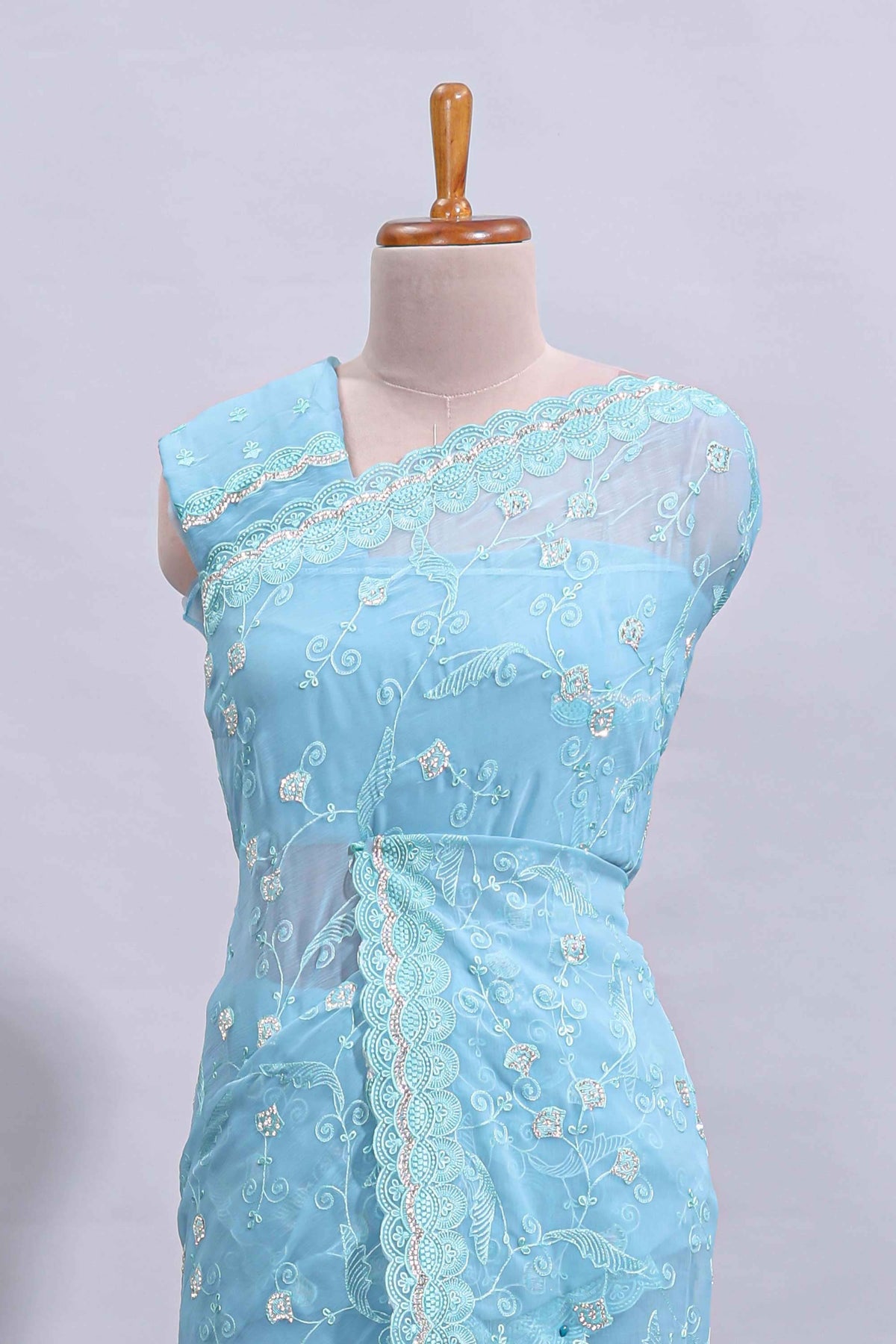 Blue floral design chamki work designer saree with self scallop border and matching blouse