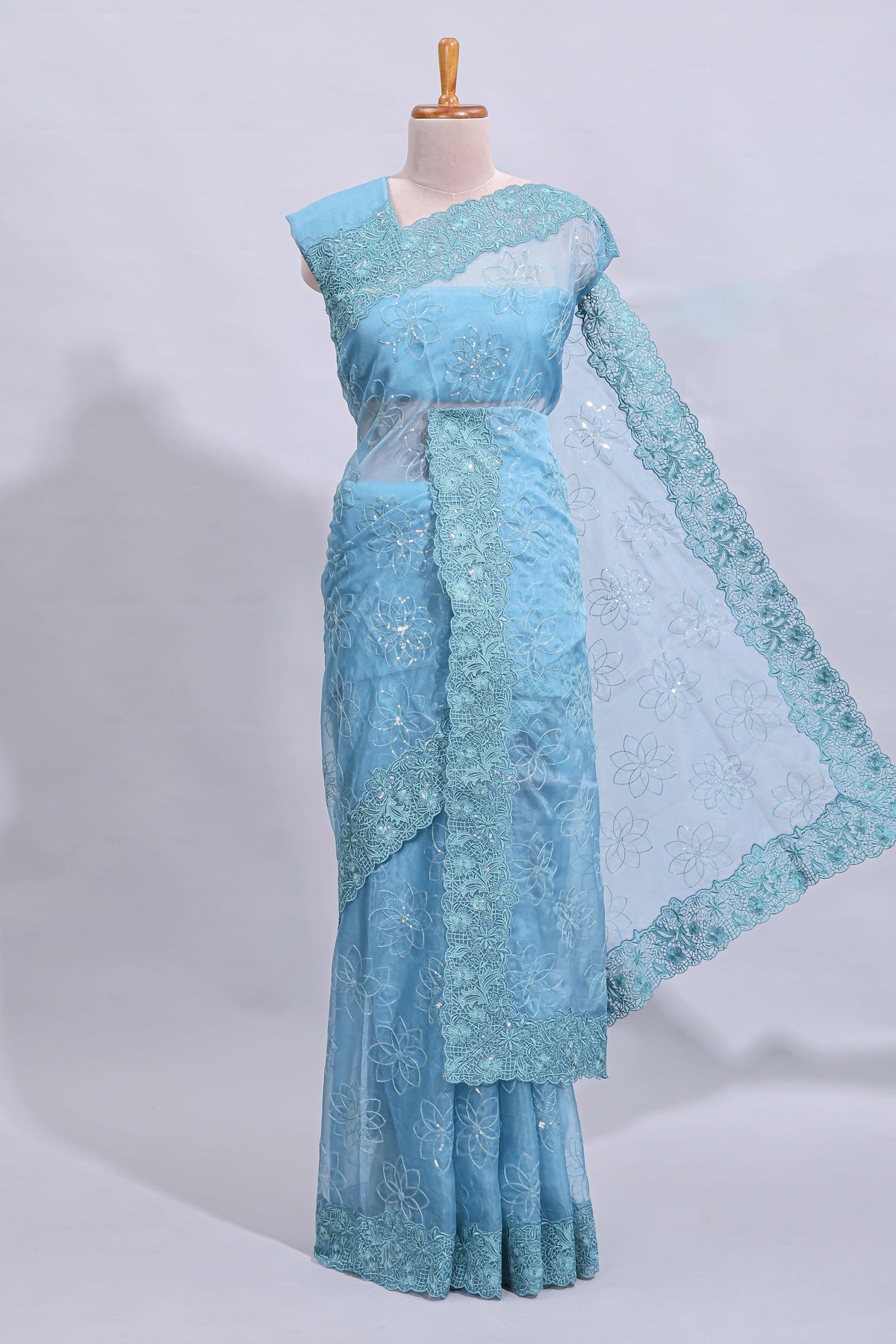 Blue floral design chamki work designer saree with self scallop border and matching blouse