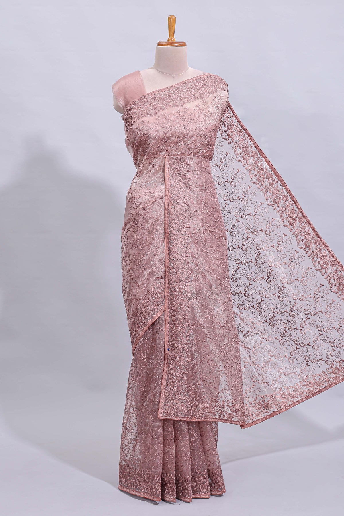 Peach floral design embroidery work designer saree with self border and matching blouse