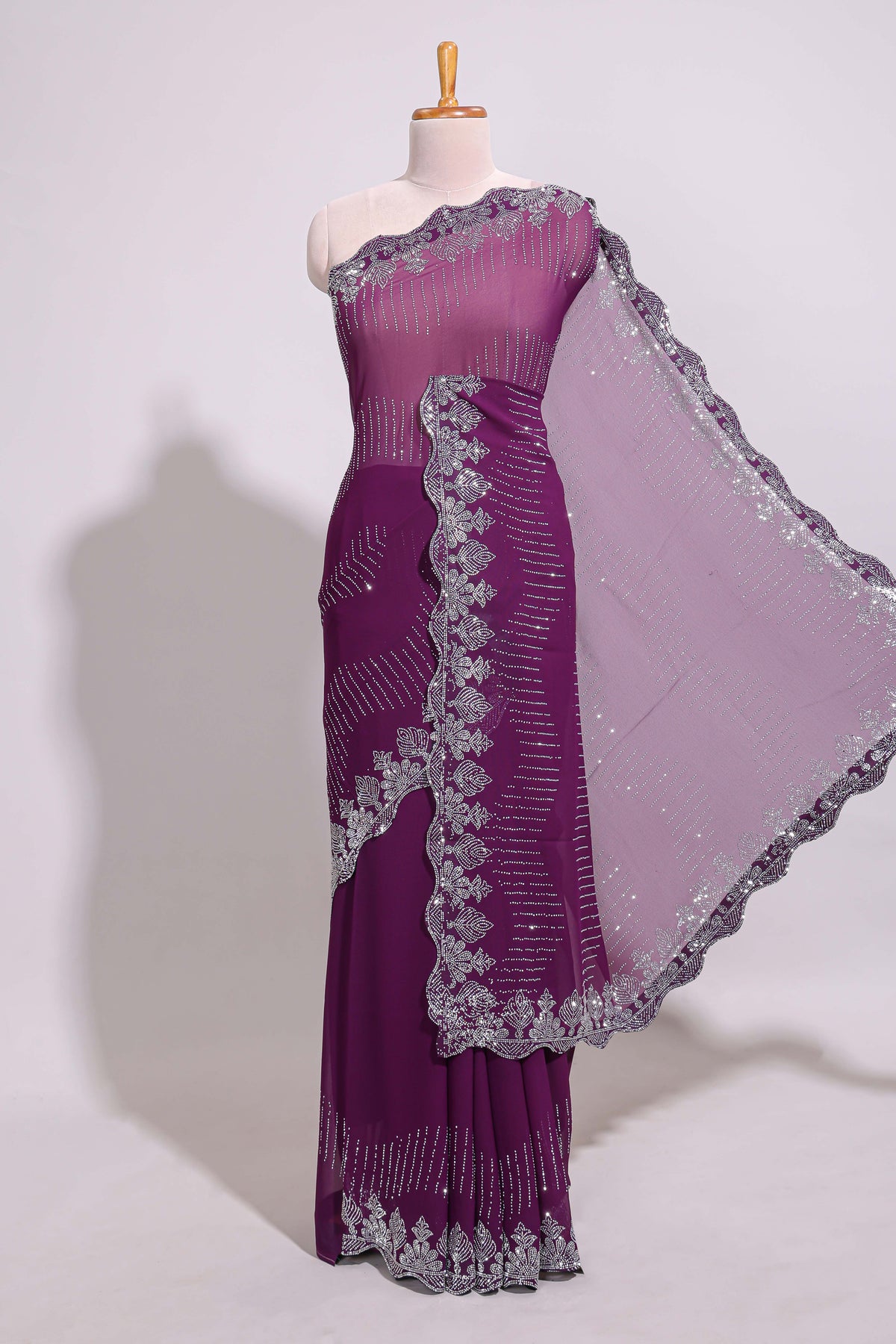 Purple saree with silver sequin wave pattern  embellished scallop border and matching designer pallu along with work blouse