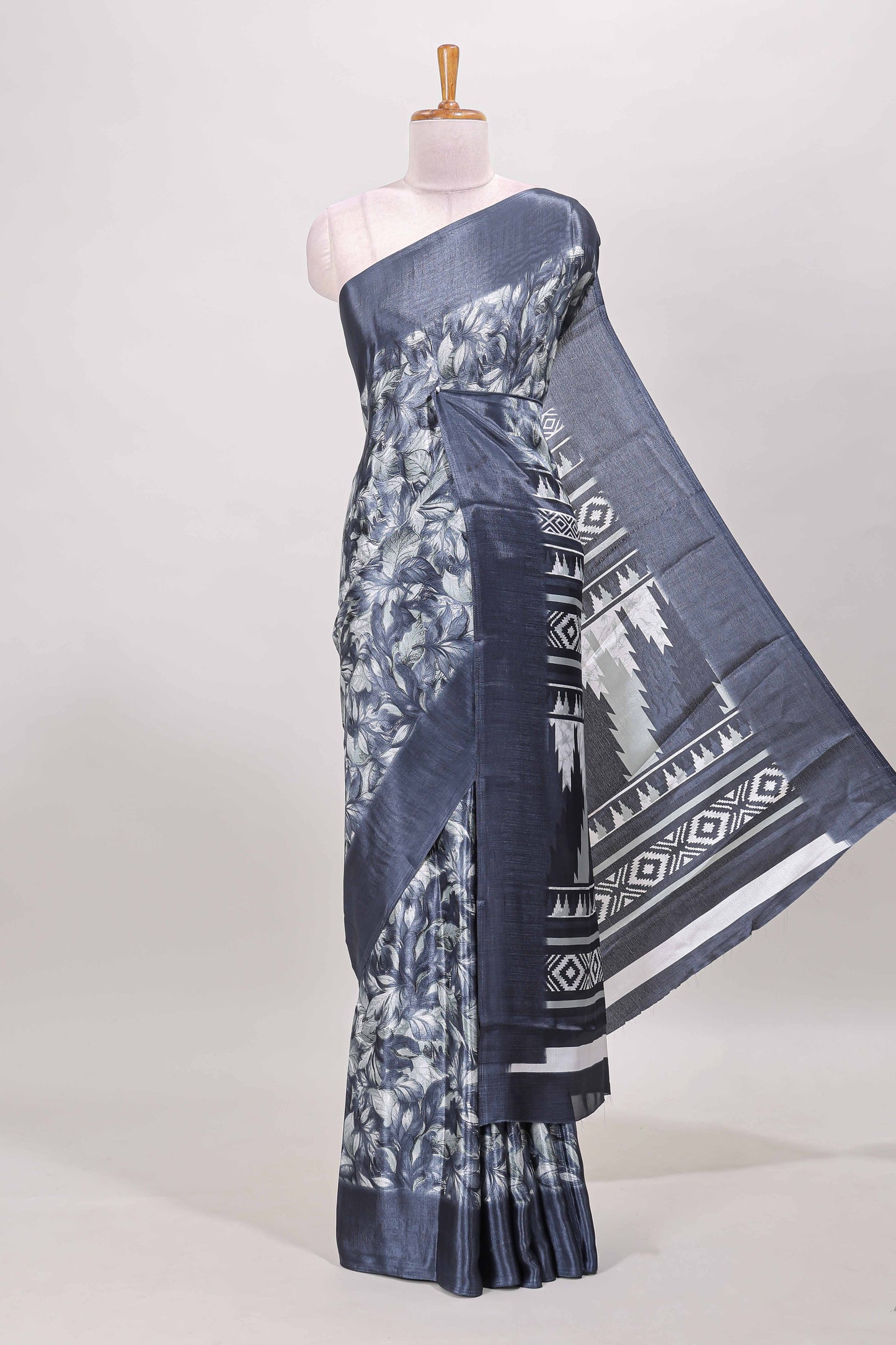 Blue all over leaf print crepe turkey saree with self border and ikkat style pallu