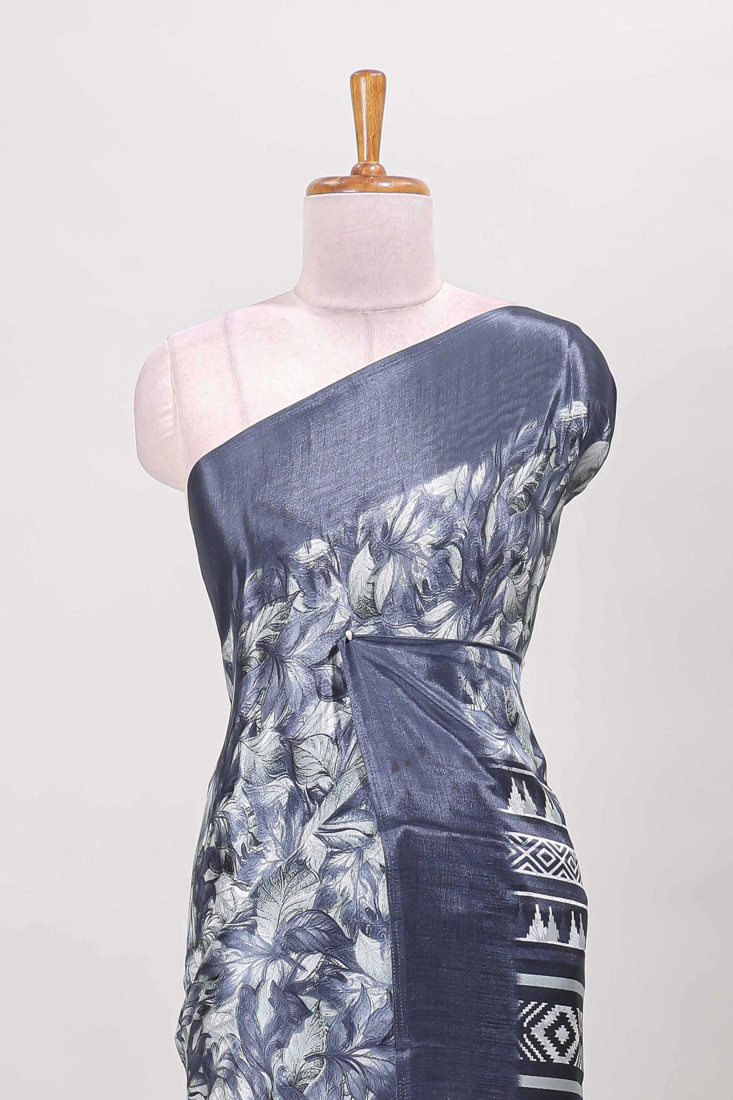 Blue all over leaf print crepe turkey saree with self border and ikkat style pallu