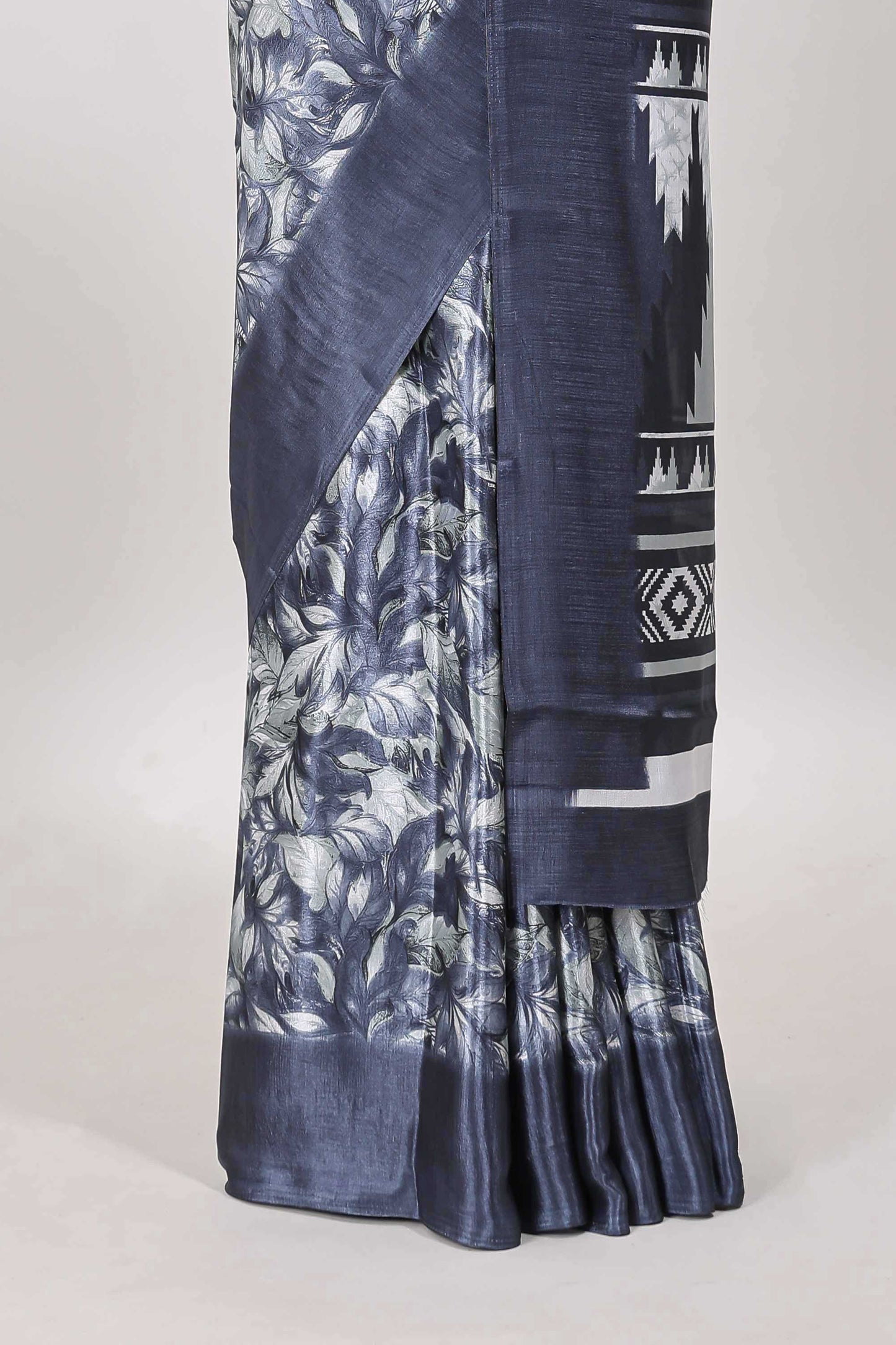 Blue all over leaf print crepe turkey saree with self border and ikkat style pallu