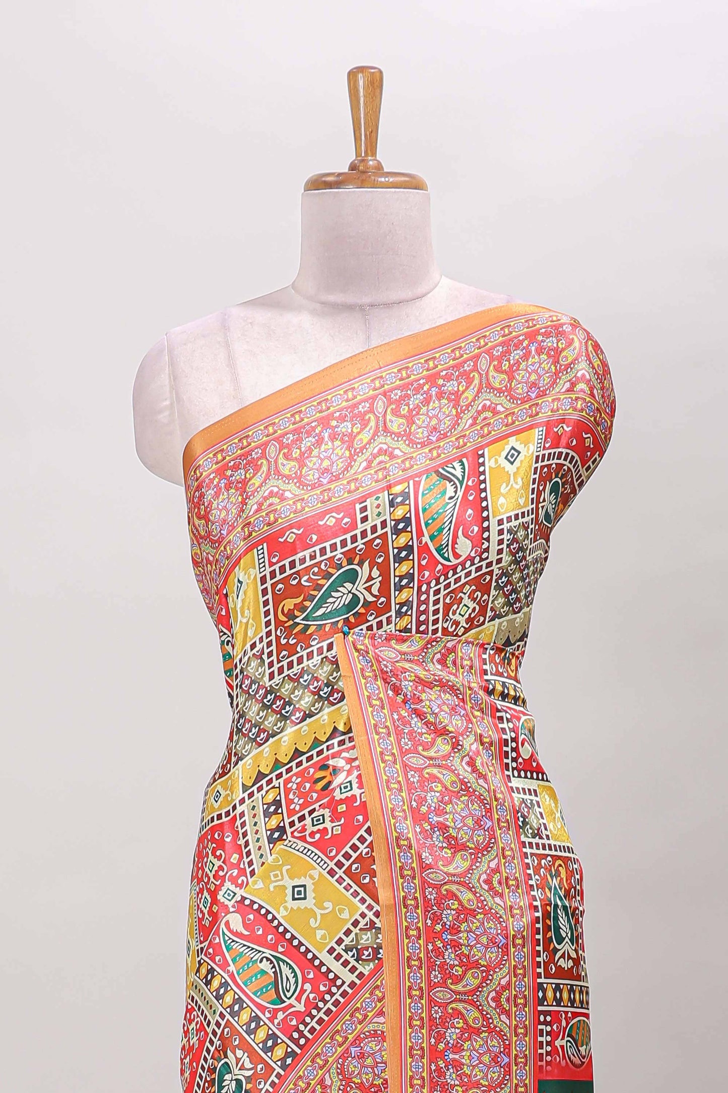 Orange geometric & ikkat design masakali saree with self border and matching blouse