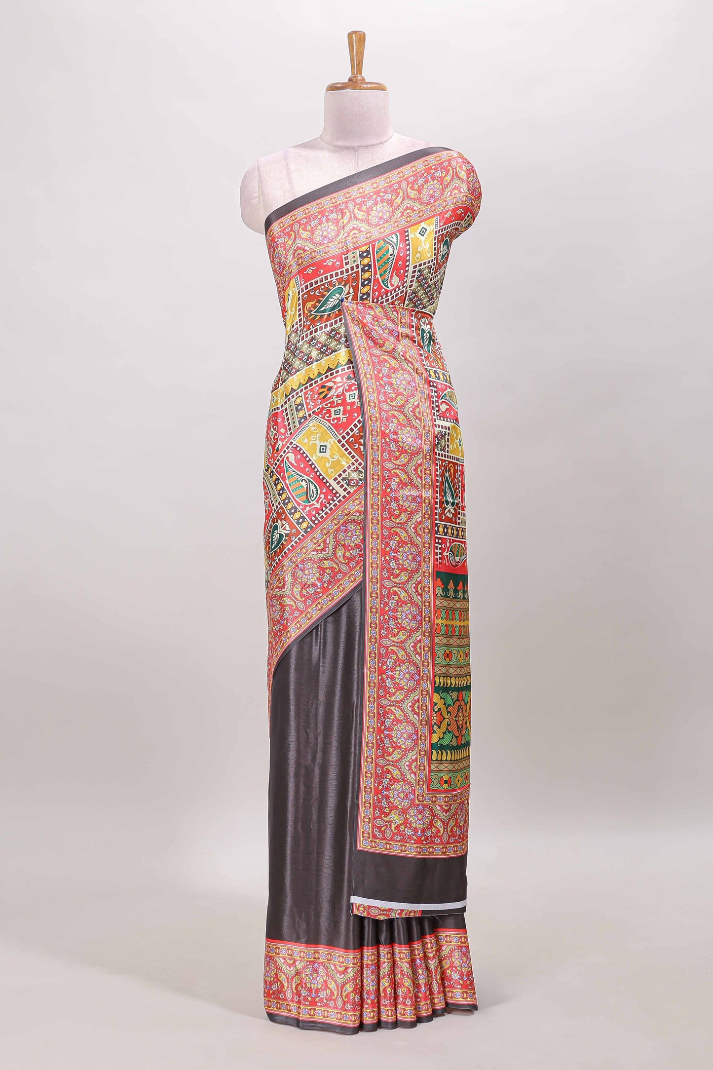 Brown geometric & ikkat design masakali saree with self border and matching blouse