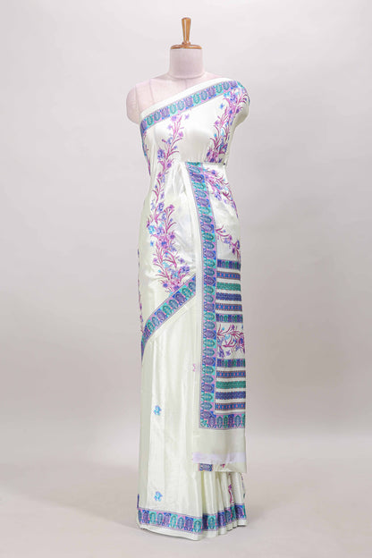 Cream floral print georgettte saree with self  floral design border matching striped pallu