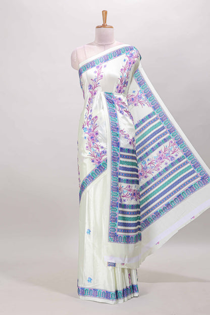 Cream floral print georgettte saree with self  floral design border matching striped pallu