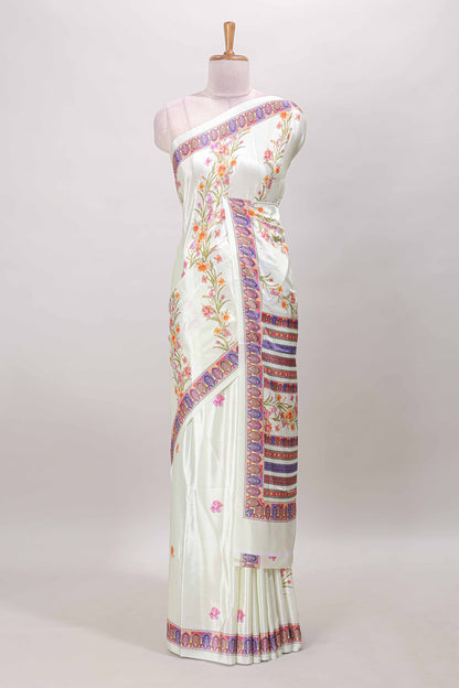 Cream floral print georgettte saree with self  floral design border matching striped pallu