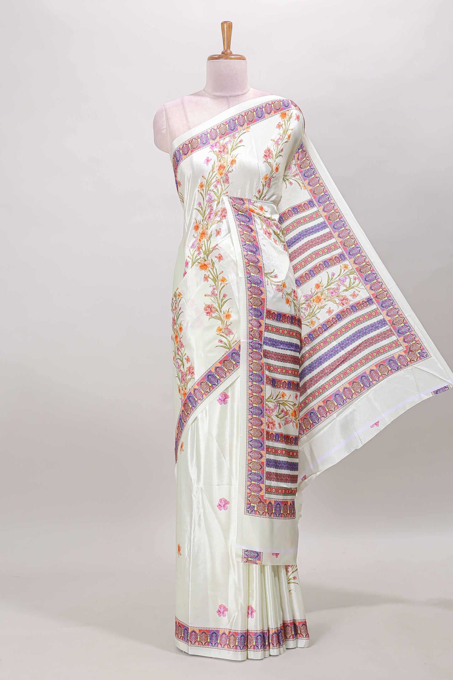 Cream floral print georgettte saree with self  floral design border matching striped pallu