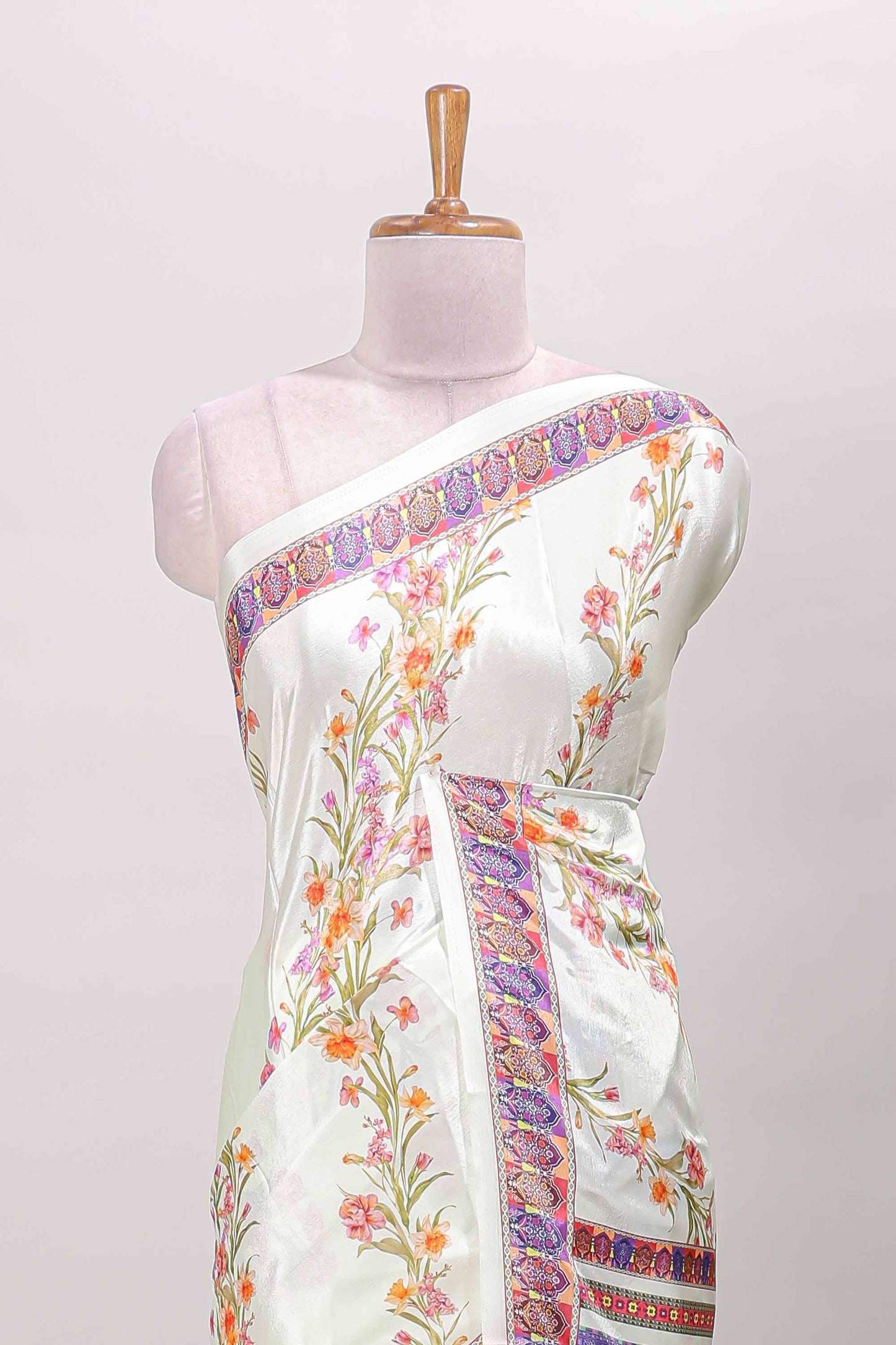 Cream floral print georgettte saree with self  floral design border matching striped pallu