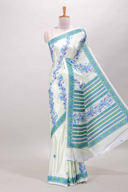 Cream floral print georgettte saree with self  floral design border matching striped pallu