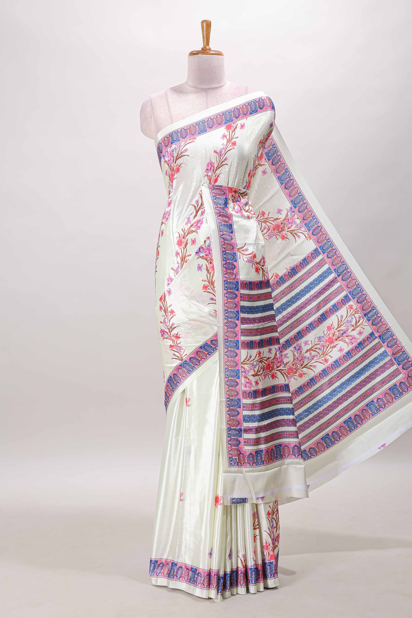 Cream floral print georgettte saree with self  floral design border matching striped pallu