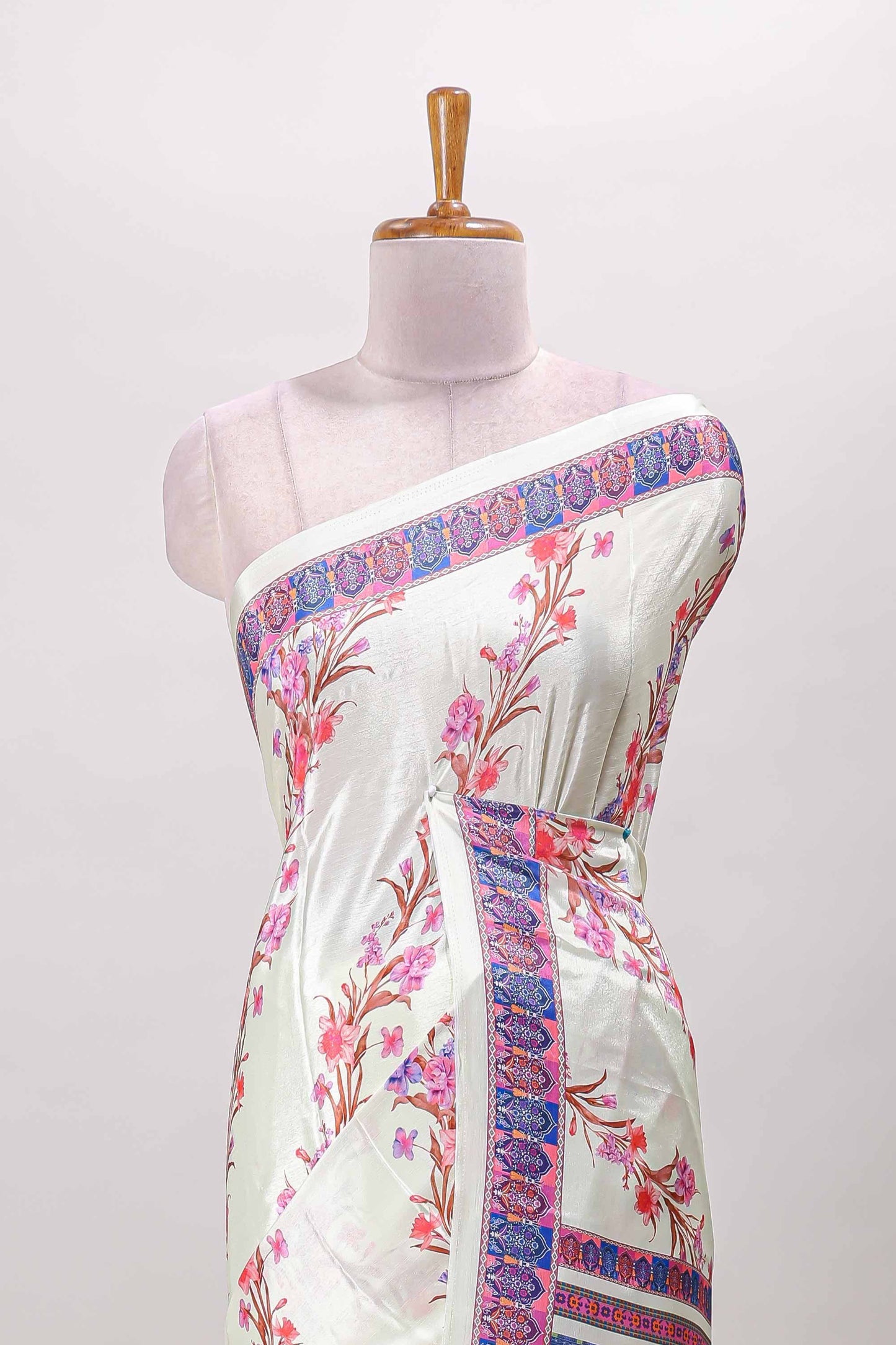 Cream floral print georgettte saree with self  floral design border matching striped pallu