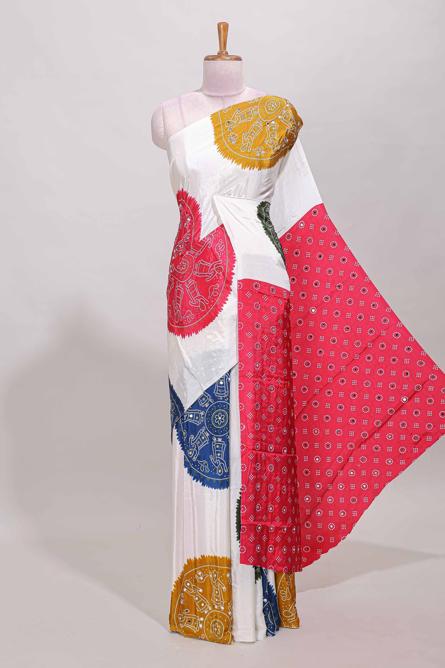 Borderless white bandhani style mirror work masakali saree with multicolor design and contrast blouse