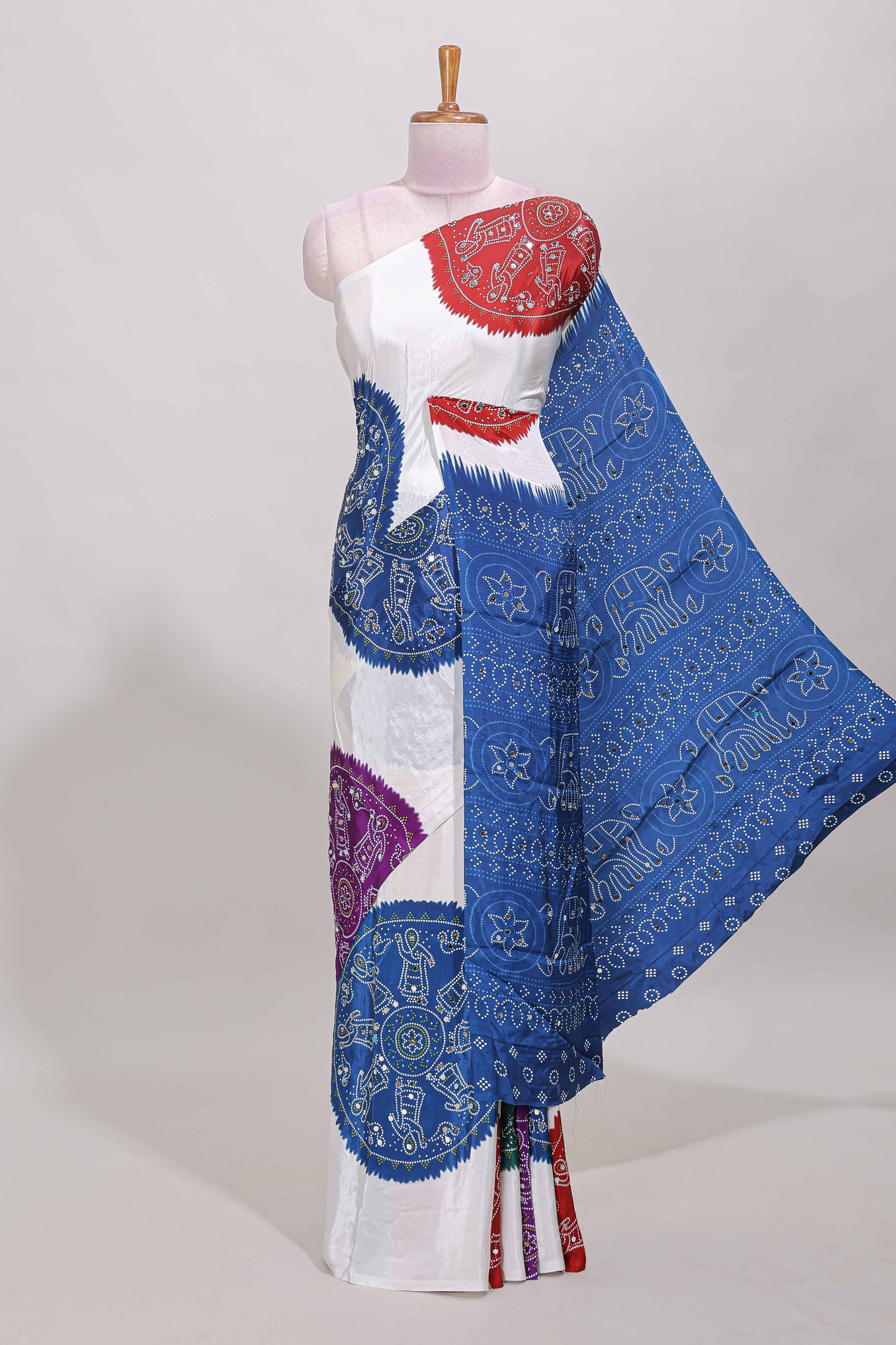 Borderless white bandhani style mirror work masakali saree with multicolor design and contrast blouse