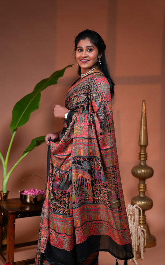 Black mughal style foil print georgette saree with self border and matching floral printed blouse