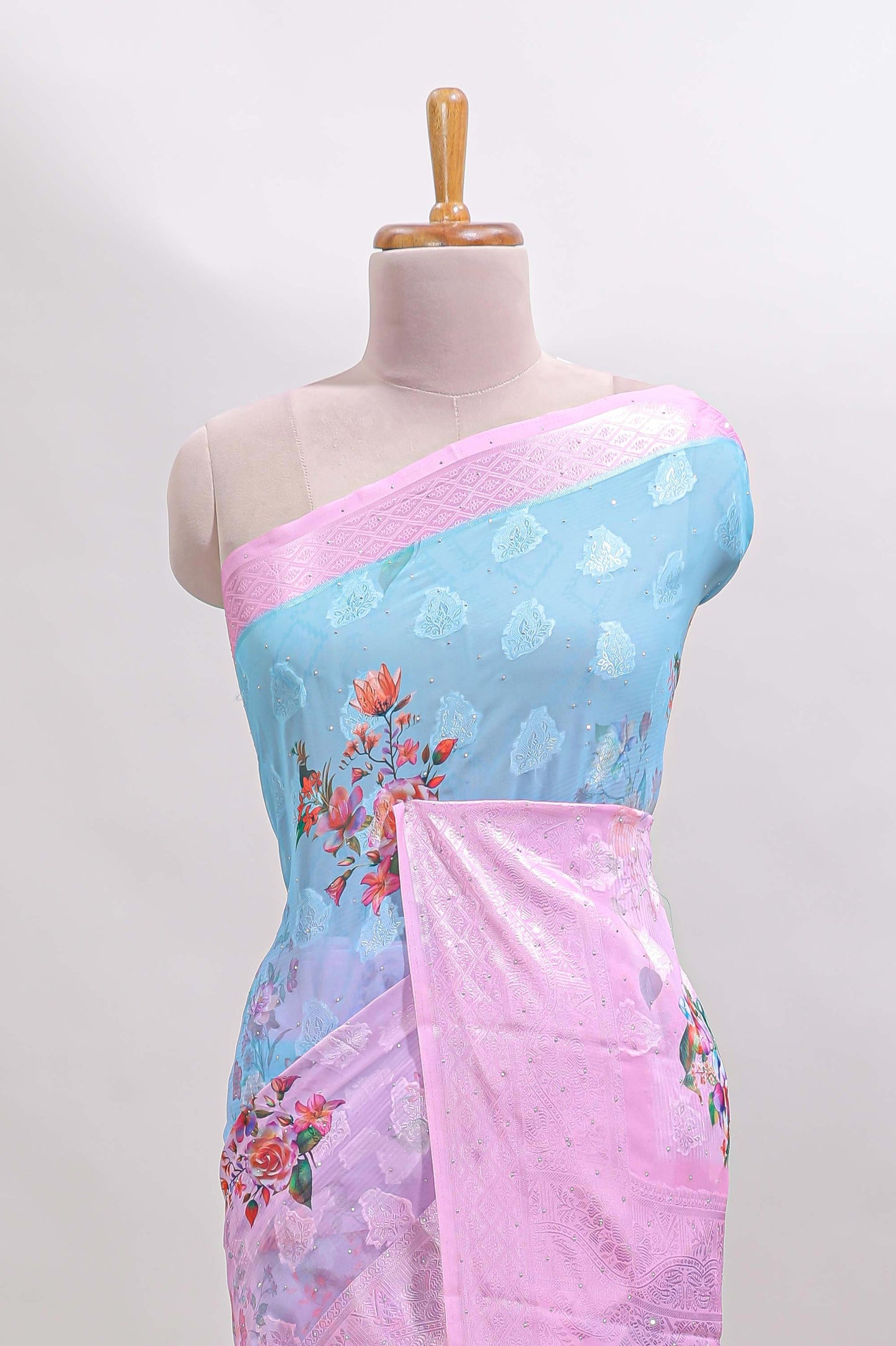 Blue & pink dual shade floral design georgette saree with contrast zari border and blouse