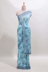 Blue floral design georgette saree with self border and matching blouse