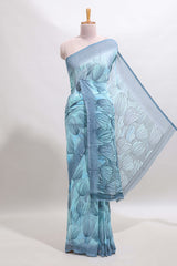 Blue floral design georgette saree with self border and matching blouse