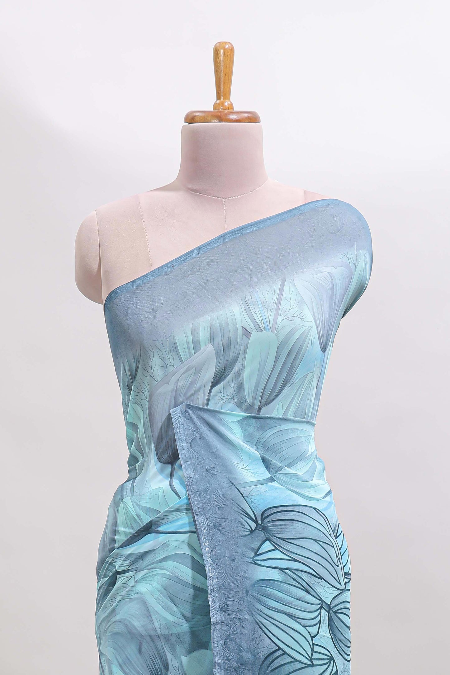Blue floral design georgette saree with self border and matching blouse