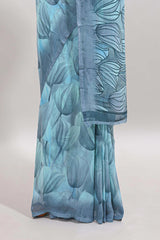 Blue floral design georgette saree with self border and matching blouse