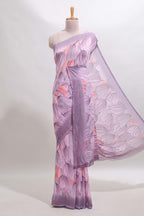 Electric lavender floral design georgette saree with self border and matching blouse